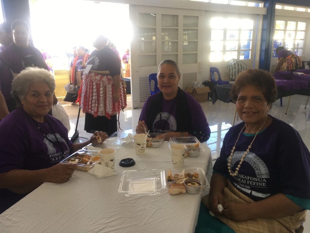 Mrs. Seketi Fuko and other participants of the Women's Fono sharing refreshments provided by WCCC.
